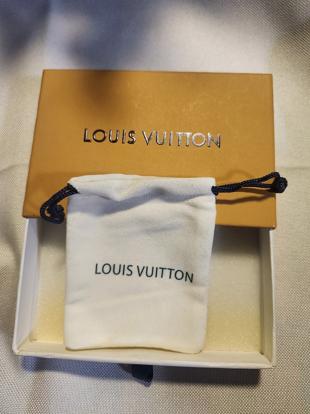 Louis Vuitton White Drawstring Pouch with Orange Box
